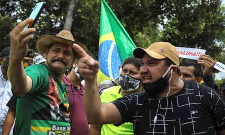 Supporters of the far-right president, Jair Bolsonaro, protest against the recommendations for social isolation of the governor of Amazonas Manaus on 19 April.