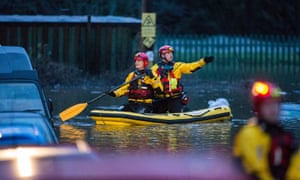 Rescuers look for stranded residents in flood-stricken Egypt Street, Pontypridd.