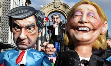 Figures of François Fillon, Marine Le Pen and other presidential candidates on show during the Carnival parade in Nice.