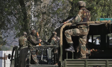 Indian soldiers guard the Uri army base attacked by suspected militants in Indian-controlled Kashmir.
