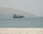 US military strikes Iran in response to attack on cargo ship, Pentagon says – live