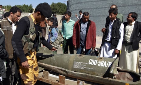 Yemenis in the capital, Sana’a, gather around the remains of what appears to a US-cluster bomb during a protest calling for an end to military operations by the Saudi-led coalition on Yemen.