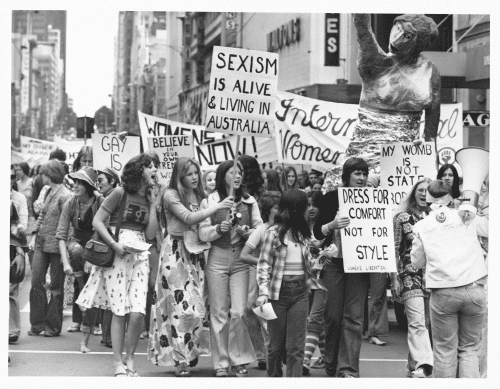 John McKinnon and Australian Information Service, Women on the march wave their placards at the International Womens Day march, Melbourne, 1975.