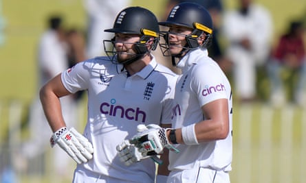England’s Gus Atkinson (left) and Jamie Smith converse during their vital partnership.