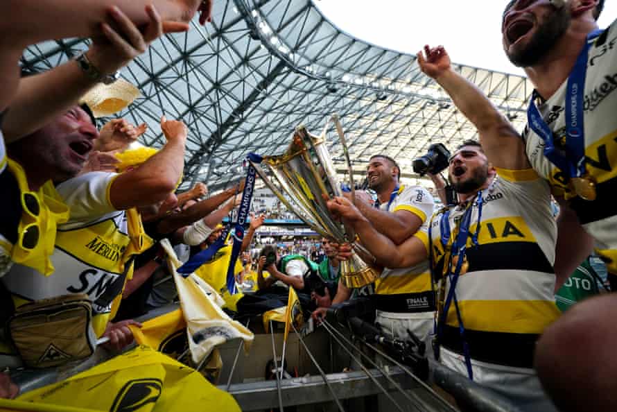 La Rochelle celebrate with the trophy and their fans after the Heineken Champions Cup final.