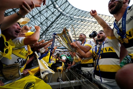 La Rochelle celebrate with the trophy and their fans after the Heineken Champions Cup final.