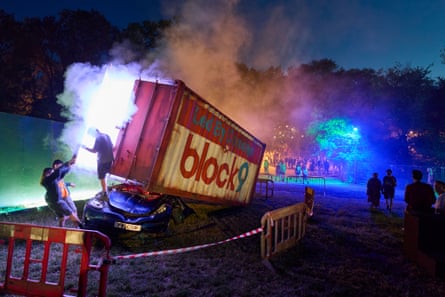 A Block9 and Led By Donkeys shipping container crushes a Tesla.