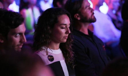 Attendees at Shine clear their minds with meditation.