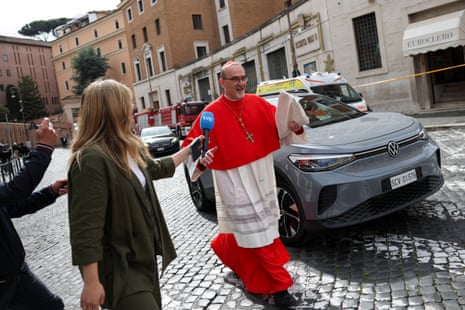 Cardinal Pierbattista Pizzaballa is interviewed on his way to the Vatican.