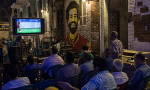 There is near silence in a Cairo coffee-house as locals sit with furrowed brows to watch Mo Salah and Liverpool take on Roma in the Champions League.