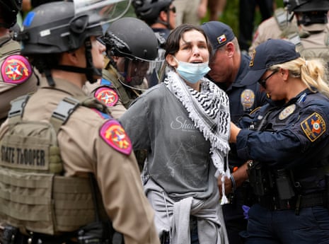 A woman is arrested at a pro-Palestinan protest at the University of Texas.