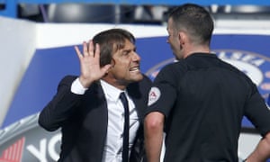 Antonio Conte has a word with the referee Michael Oliver during the 0-0 game against Arsenal