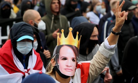 Protester wearing Svetlana Tikhanovskaya mask