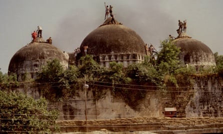 The demolishing of the Babri Masjid mosque in 1992.