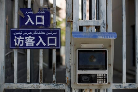 A government-installed facial recognition device to grant residents access to their housing compound in Urumqi, Xinjiang.