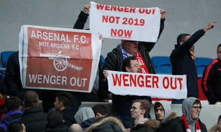 Arsenal fans show their anger towards Arsène Wenger during the defeat at Brighton.