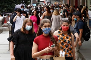 People walk along a busy Bourke Street Mall in Melbourne’s CBD.