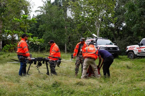 Emergency workers using drones to deliver food to families cut off by flooding caused by the storm in the Dominican Republic.