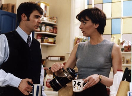 Jack Davenport and Daniela Nardini look at each other in the kitchen in a This Life episode