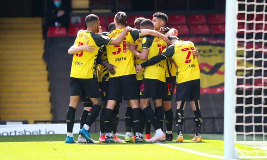 Watford’s players celebrate the goal scored against Millwall which clinched automatic promotion from the Championship