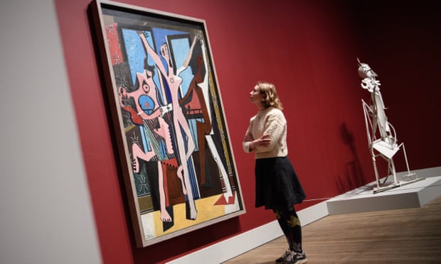 A woman looks at a Picasso painting at Tate Modern