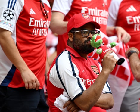 An Arsenal fan in pensive mood.