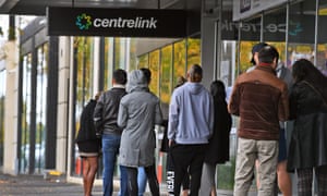 People queue up outside a Centrelink office in Melbourne on 20 April 2020