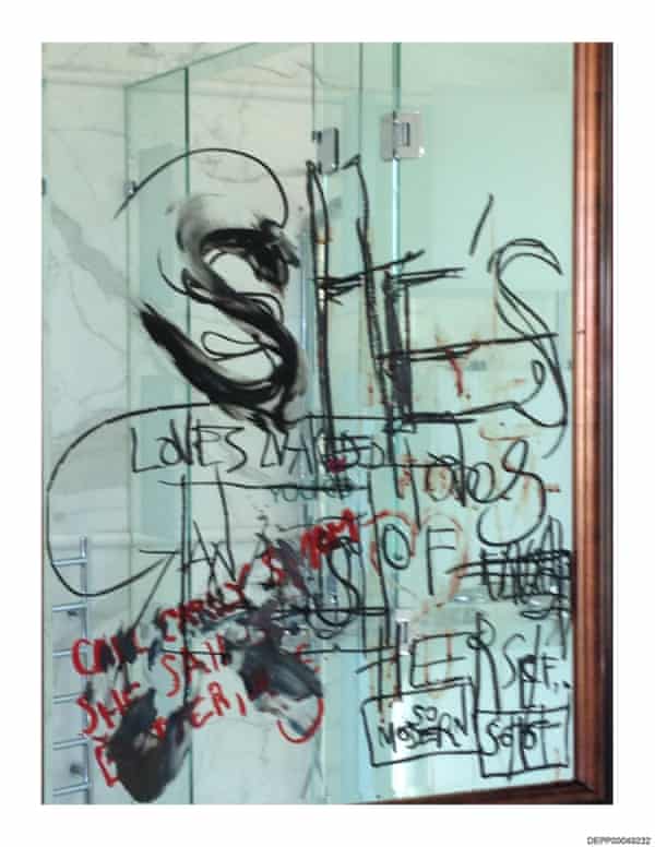 The mirror, shown in court, that Johnny Depp had defaced, with the Carly Simon reference in the bottom left corner.