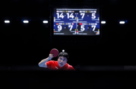 Liang Jingkun (China) serves in his defeat by Oh Jun-sung of Korea