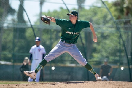 Genevieve Beacom pitching in her Australian uniform