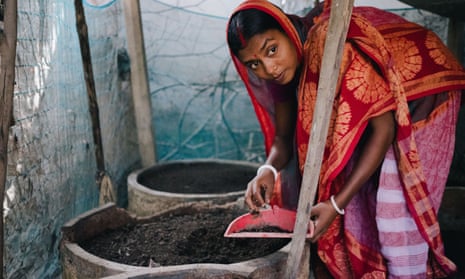 Preparing compost in flood-prone Bangladesh