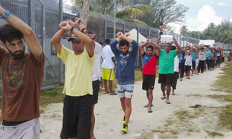 Asylum seekers and refugees protest at the now-closed Manus Island immigration detention centre. Twelve former Australians of the Year have condemned the Coalition government for the standoff there.
