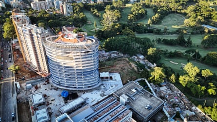 From the air, many homes in Quilombo Kédi, a black neighbourhood in Porto Alegre, can be seen in ruins on the fringes of a modern development.