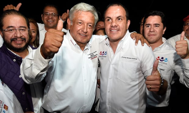Presidential candidate Andres Manuel Lopez Obrador (left) poses with  Cuauhtémoc Blanco during a campaign rally