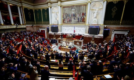 Members of parliament applaud after a vote to enshrine abortion rights in the constitution, at the National Assembly in Paris, France, November 24