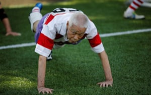 Ryuichi Nagayama, 86, Fuwaku’s oldest player, warms up before the match