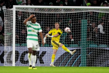 Celtic goalkeeper Viljami Sinisalo kicks the ball away after conceding a second goal