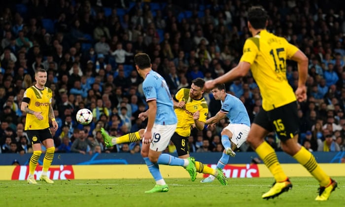 Manchester City's John Stones (second on the right) scores the equalizer for his team.