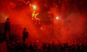 Football fans celebrate at Anfield
