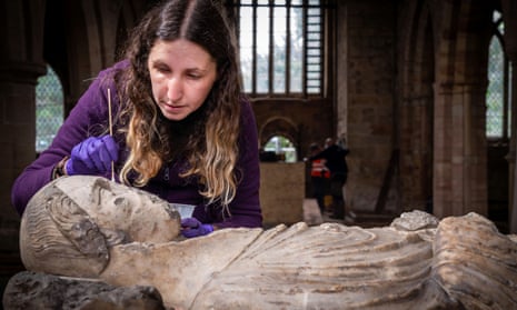Conservator Laura Parker works on the effigy inside St Wilfrid’s church.