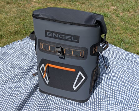 cooler on beach blanket in grass