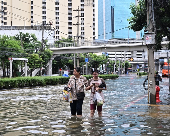 ‘Our house was under water’: Bangkok floods force thousands into shelters as disaster declared