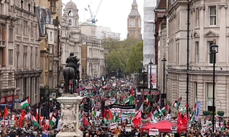 People protest during a march in solidarity with Palestinians in Gaza in London, Britain, April 27, 2024.