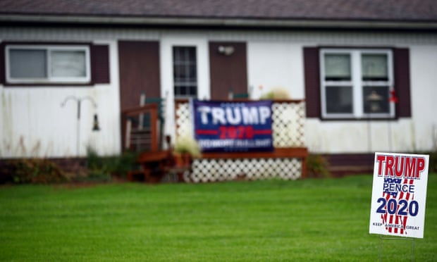 A yard sign supporting U.S President Donald Trump is seen outside a house in Lancaster, Pennsylvania, U.S. October 25, 2020. REUTERS/Hannah McKay