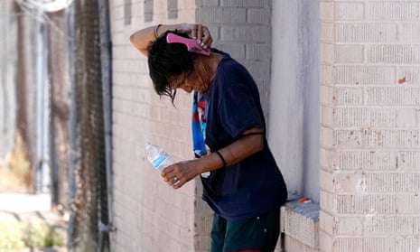 A person tries to cool off in the shade in Phoenix this week.