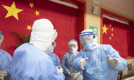 Medical staff are seen in a makeshift hospital in Wuhan.