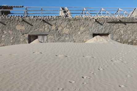 An almost completely submerged concrete building in Hobyo
