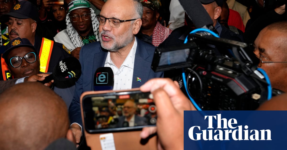 South African ambassador expelled from US welcomed home by supporters