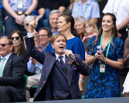 National institution … Cliff Richard sings to Centre Court at Wimbledon in 2022.