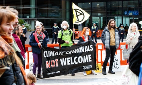 Climate protesters rally outside the Appea conference in Adelaide on 18 May.
